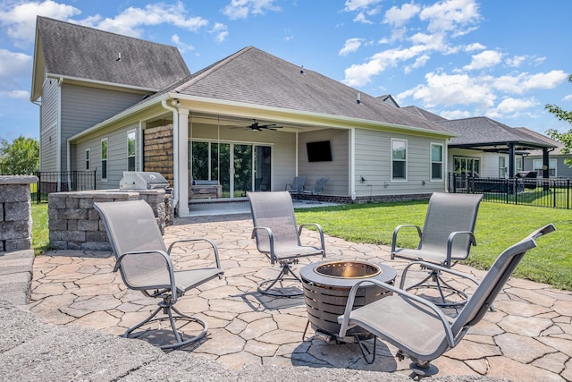 2050 Beamon Dr, Franklin, TN 37064 - view of patio featuring a fire pit, an outdoor kitchen, and ceiling fan
