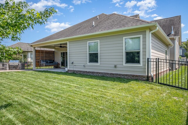 2050 Beamon Dr, Franklin, TN 37064 - back of property with exterior kitchen, a ceiling fan, a shingled roof, and a patio area