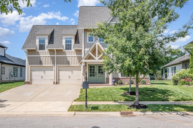 2050 Beamon Dr, Franklin, TN 37064 - view of front facade with a shingled roof, board and batten siding, french doors, concrete driveway, and an attached garage