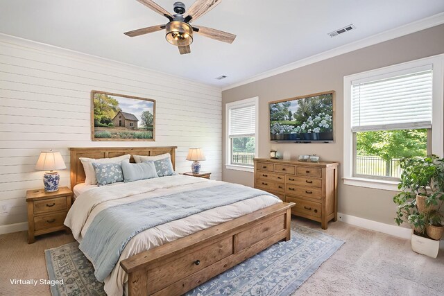 2050 Beamon Dr, Franklin, TN 37064 - bedroom with light colored carpet, wood walls, ornamental molding, and ceiling fan