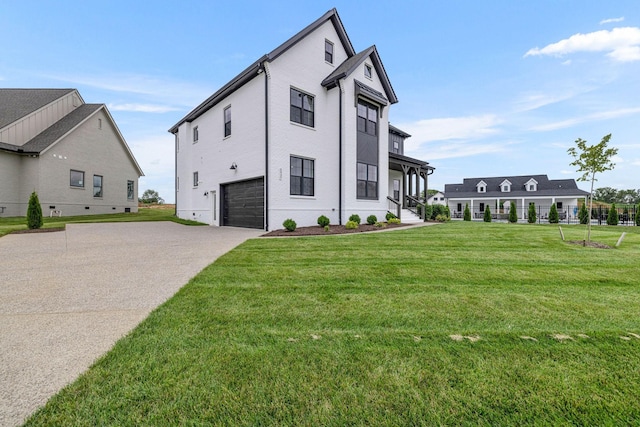 5937 Hunt Valley Dr, Spring Hill, TN 37174 - view of home's exterior featuring concrete driveway, an attached garage, and a yard