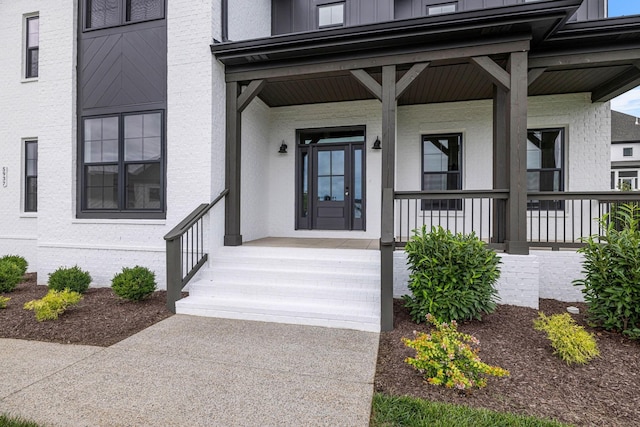 5937 Hunt Valley Dr, Spring Hill, TN 37174 - property entrance featuring brick siding and covered porch