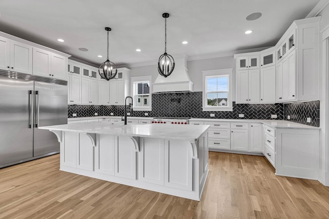 5937 Hunt Valley Dr, Spring Hill, TN 37174 - kitchen featuring stainless steel built in refrigerator, light wood-type flooring, white cabinets, crown molding, and recessed lighting