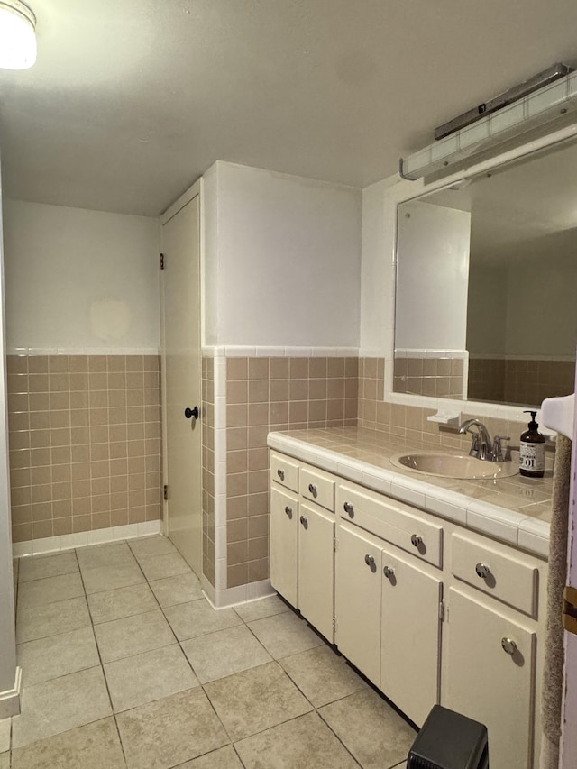 625 College Ave E, Carthage, TN 37030 - bathroom with tile walls, tile patterned flooring, vanity, and a wainscoted wall