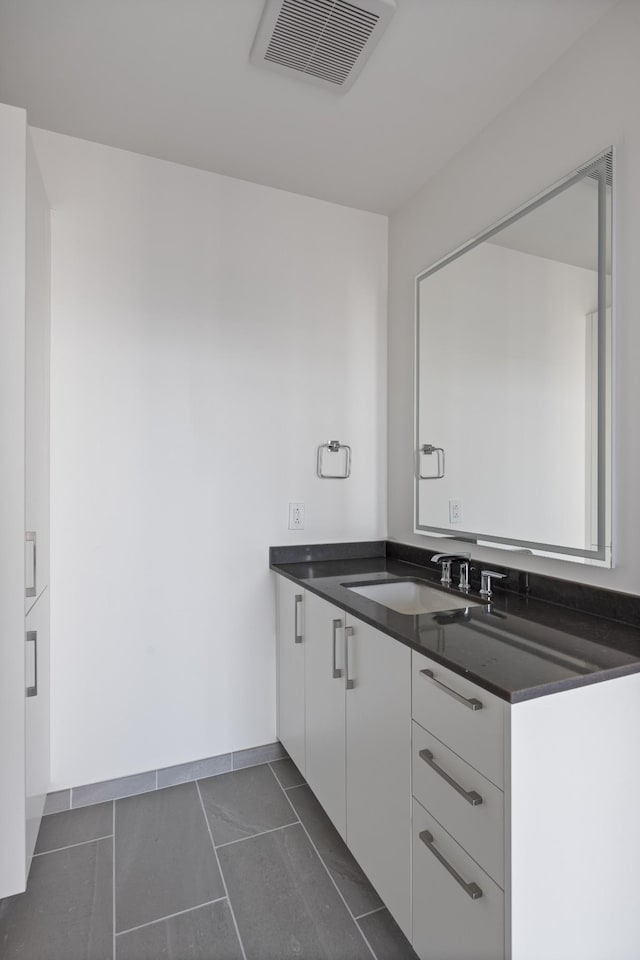1212 Demonbreun St Unit A9 L, Nashville, TN 37203 - bathroom with vanity and tile patterned flooring