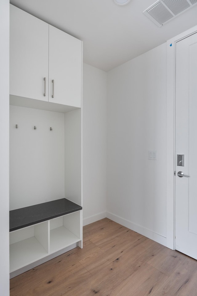 1212 Demonbreun St Unit A9 L, Nashville, TN 37203 - mudroom with light wood-style floors and baseboards