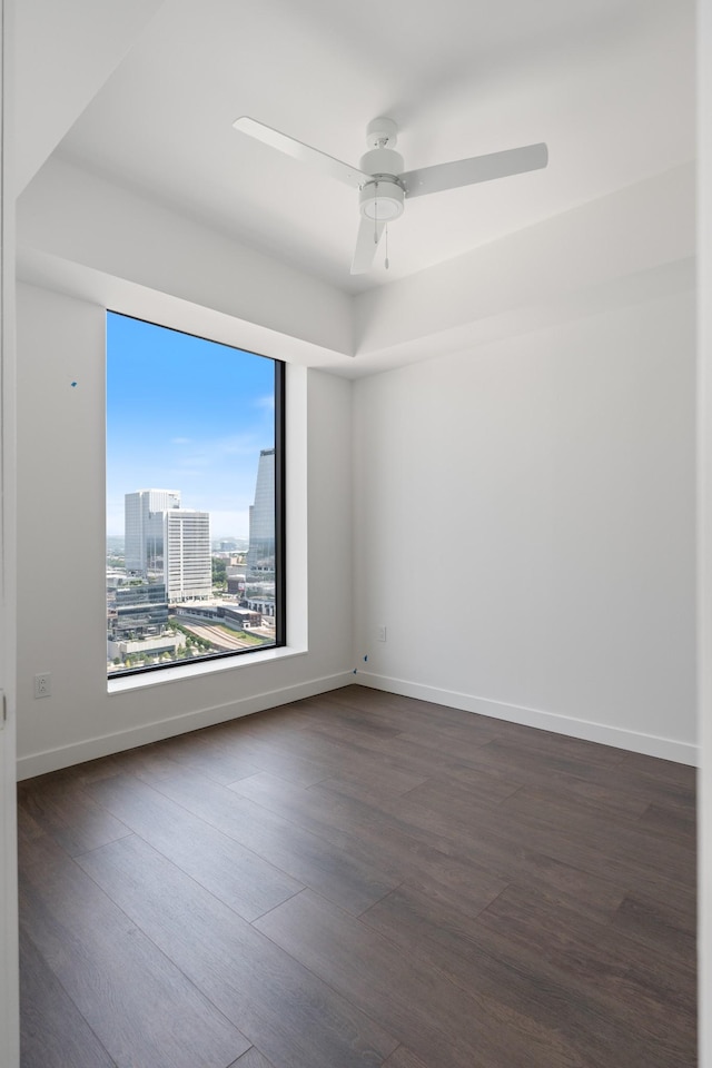 1212 Demonbreun St Unit A9 L, Nashville, TN 37203 - empty room with wood finished floors and a ceiling fan