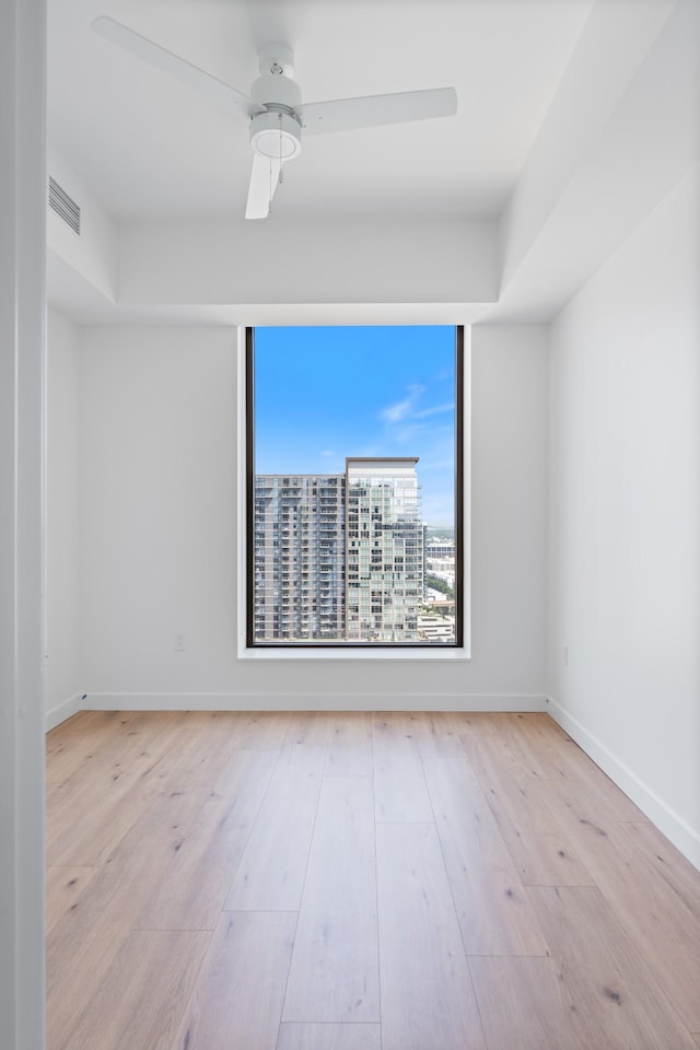 1212 Demonbreun St Unit A9 L, Nashville, TN 37203 - empty room featuring hardwood / wood-style floors and a ceiling fan