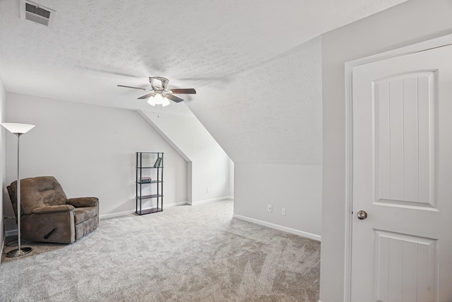 427 Rick Mccormick Dr, La Vergne, TN 37086 - additional living space featuring a textured ceiling, a ceiling fan, carpet flooring, and vaulted ceiling