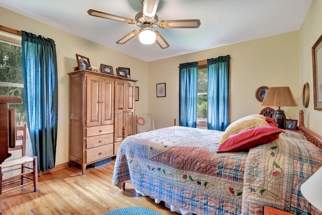 6861 Arno Allisona Rd, College Grove, TN 37046 - bedroom with light wood-type flooring and a ceiling fan