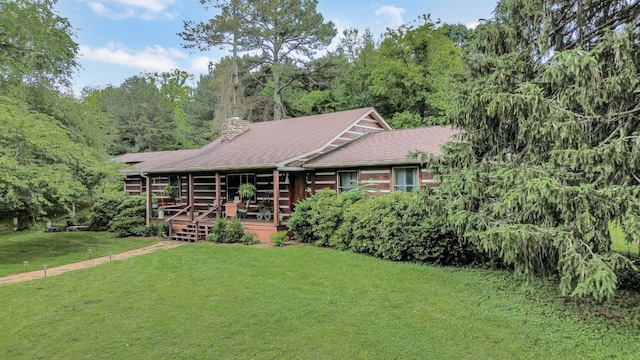 6861 Arno Allisona Rd, College Grove, TN 37046 - view of front of house with a front lawn, a chimney, and roof with shingles