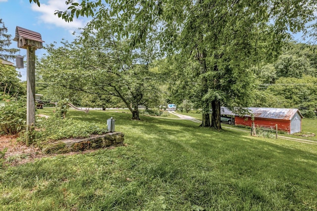 6861 Arno Allisona Rd, College Grove, TN 37046 - view of grassy yard featuring an outbuilding