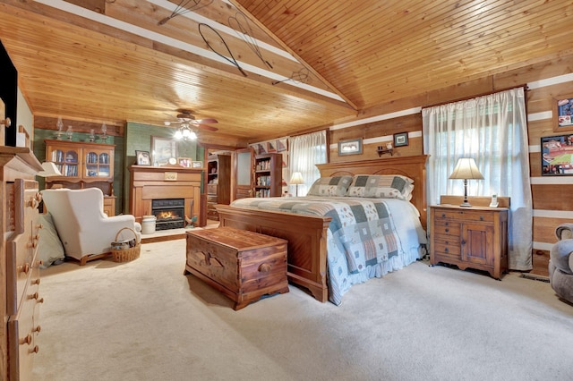 6861 Arno Allisona Rd, College Grove, TN 37046 - carpeted bedroom with a fireplace with flush hearth, lofted ceiling, wood ceiling, and wooden walls