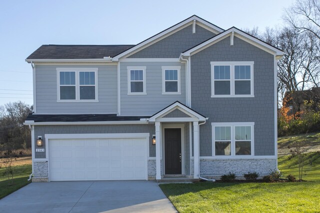 2322 Williamsport Lndg, Columbia, TN 38401 - craftsman inspired home featuring driveway, a front lawn, stone siding, and a garage