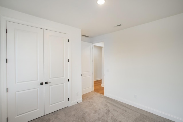 2322 Williamsport Lndg, Columbia, TN 38401 - unfurnished bedroom featuring a closet and carpet flooring