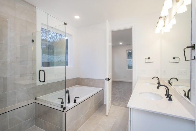 2322 Williamsport Lndg, Columbia, TN 38401 - bathroom featuring a garden tub, tile patterned flooring, double vanity, a shower stall, and recessed lighting