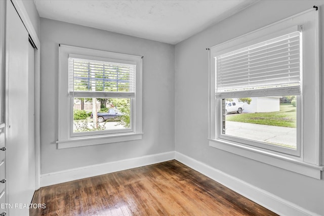 4616 Coile Rd, Knoxville, TN 37918 - empty room featuring baseboards and dark wood-style floors