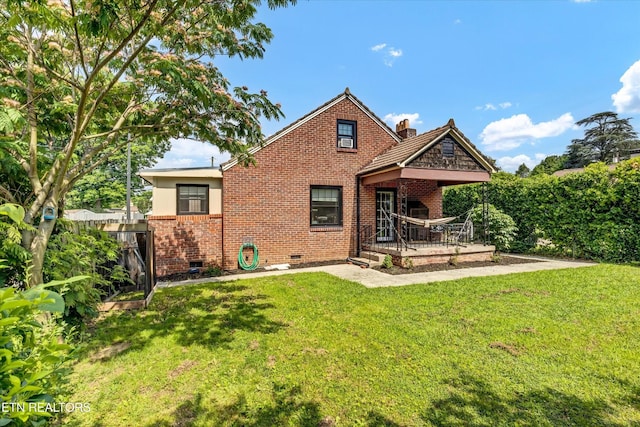 4616 Coile Rd, Knoxville, TN 37918 - back of house with brick siding, crawl space, and a chimney