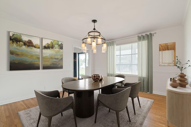 1111 Chickasaw Dr, Brentwood, TN 37027 - dining area with crown molding, light wood finished floors, and a chandelier