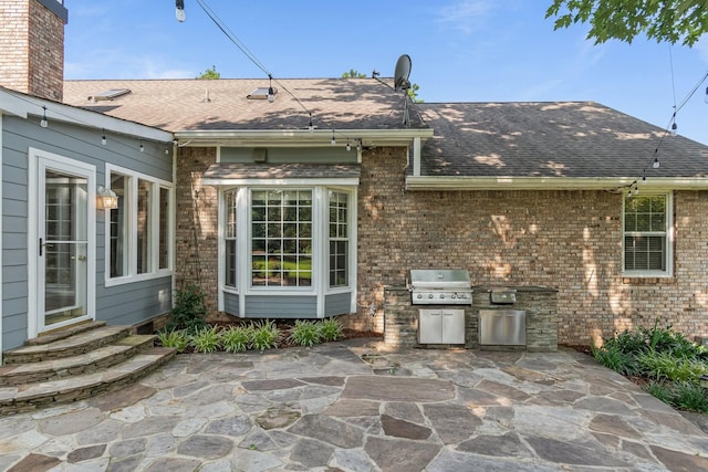 1111 Chickasaw Dr, Brentwood, TN 37027 - view of patio featuring an outdoor kitchen and entry steps