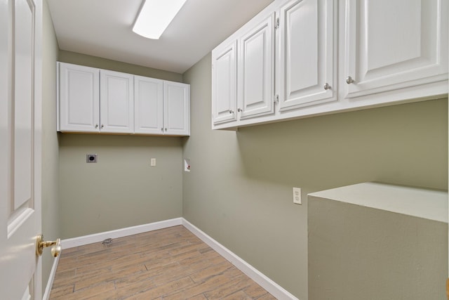 1111 Chickasaw Dr, Brentwood, TN 37027 - washroom featuring hookup for an electric dryer, cabinet space, and light wood finished floors
