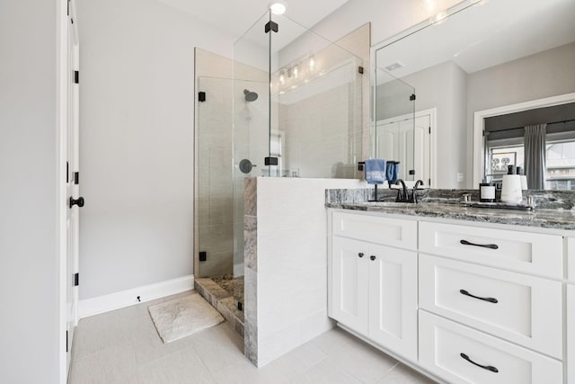 1037 Jackston Mack Way, Gallatin, TN 37066 - bathroom featuring vanity, a shower stall, and tile patterned floors