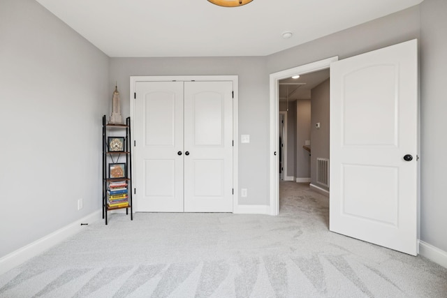 1037 Jackston Mack Way, Gallatin, TN 37066 - unfurnished bedroom with a closet and light colored carpet