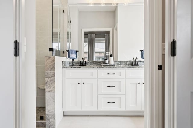 1037 Jackston Mack Way, Gallatin, TN 37066 - full bath with tiled shower, double vanity, and tile patterned flooring