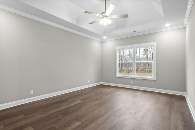 108 Hummingbird Way, Clarksville, TN 37043 - spare room with dark wood-type flooring, a ceiling fan, a tray ceiling, crown molding, and recessed lighting