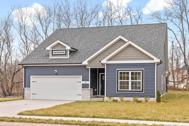 108 Hummingbird Way, Clarksville, TN 37043 - craftsman inspired home featuring roof with shingles, a front yard, concrete driveway, and an attached garage