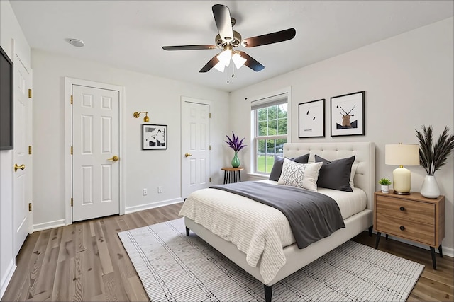 853 Hornbuckle Rd, Clarksville, TN 37043 - bedroom with wood finished floors and a ceiling fan