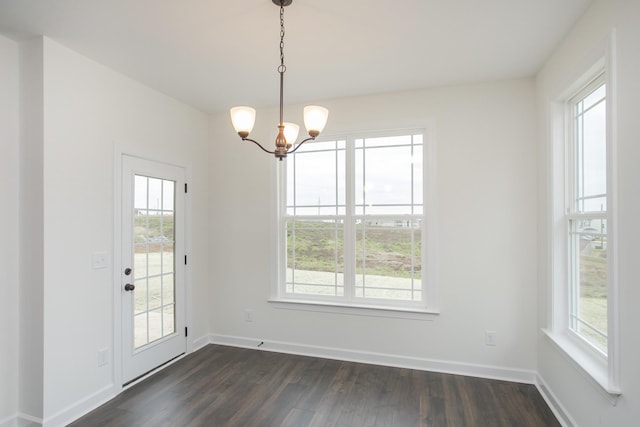 4024 Rampart Way, Spring Hill, TN 37174 - unfurnished dining area with dark wood-style flooring and a chandelier
