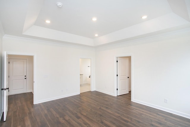 4024 Rampart Way, Spring Hill, TN 37174 - empty room featuring a tray ceiling, dark wood-style floors, a smoke detector, recessed lighting, and crown molding