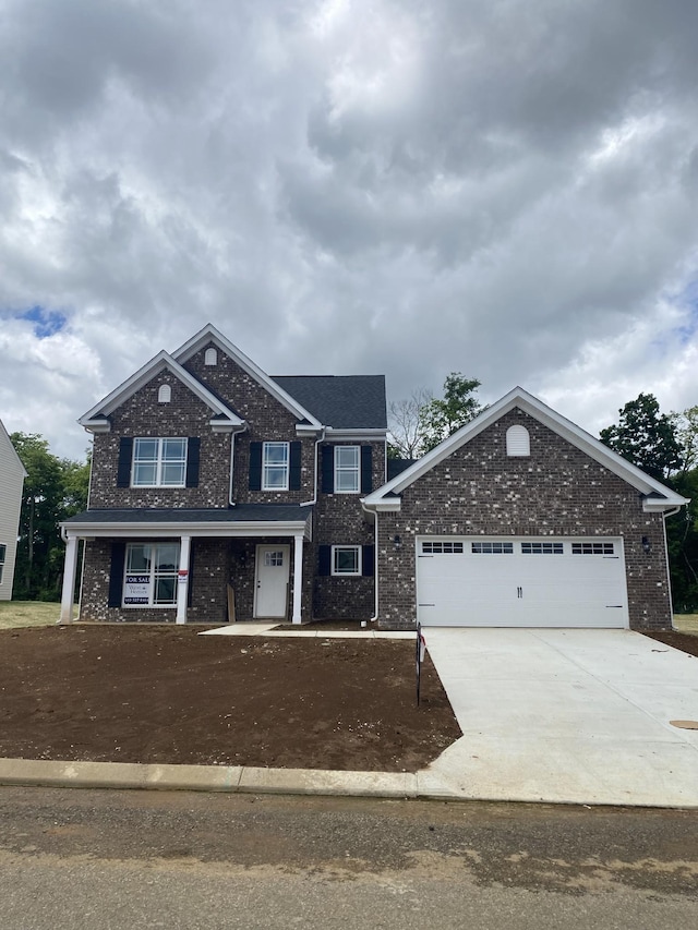 4024 Rampart Way, Spring Hill, TN 37174 - view of front facade featuring brick siding, concrete driveway, and an attached garage