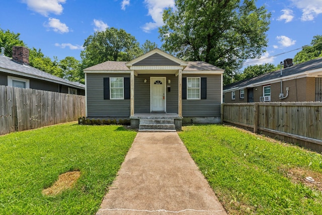 2191 Clayton Ave, Memphis, TN 38108 - bungalow-style house with a fenced backyard