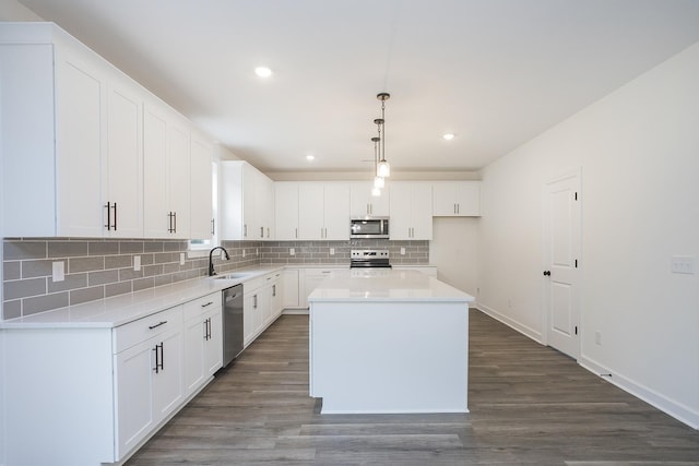 4022 Rampart Way, Spring Hill, TN 37174 - kitchen featuring stainless steel appliances, tasteful backsplash, white cabinets, and recessed lighting