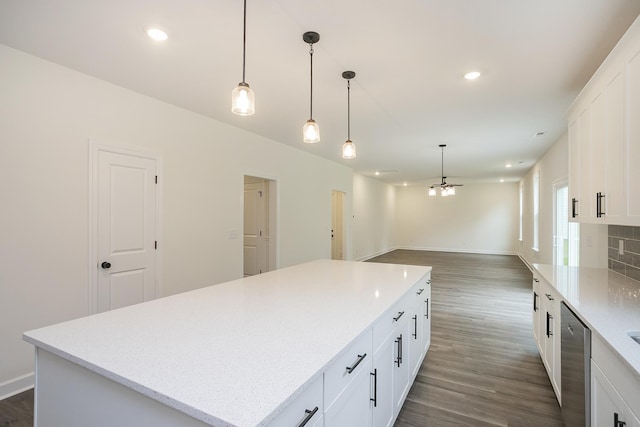 4022 Rampart Way, Spring Hill, TN 37174 - kitchen with dark wood-type flooring, a kitchen island, white cabinetry, recessed lighting, and pendant lighting