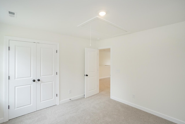 4022 Rampart Way, Spring Hill, TN 37174 - unfurnished bedroom with attic access, carpet, and a closet
