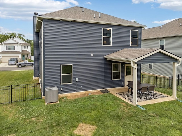 3276 Holiday Ln, Columbia, TN 38401 - back of property with a patio area and roof with shingles
