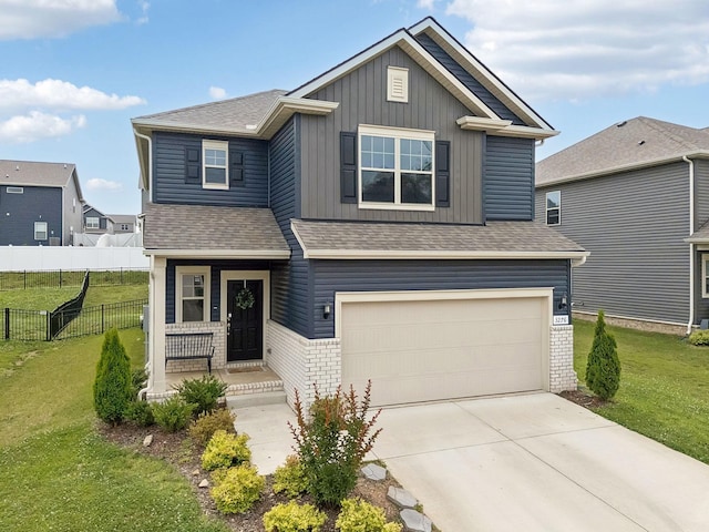 3276 Holiday Ln, Columbia, TN 38401 - view of front of house featuring an attached garage, board and batten siding, a shingled roof, and driveway