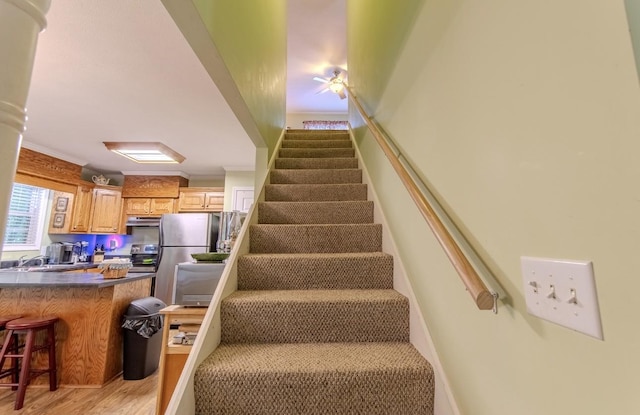 730 Carlew Rd, Waynesboro, TN 38485 - stairway with wood finished floors and crown molding