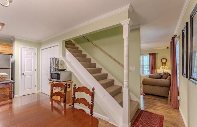 730 Carlew Rd, Waynesboro, TN 38485 - stairway with crown molding and wood finished floors