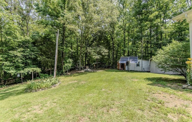 730 Carlew Rd, Waynesboro, TN 38485 - view of green lawn featuring an outdoor structure