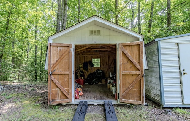 730 Carlew Rd, Waynesboro, TN 38485 - view of outdoor structure featuring a wooded view