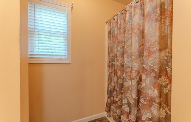 730 Carlew Rd, Waynesboro, TN 38485 - bathroom with a shower with curtain and baseboards