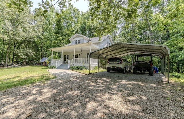 730 Carlew Rd, Waynesboro, TN 38485 - view of front facade with a porch, a detached carport, a front yard, and dirt driveway