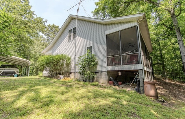 730 Carlew Rd, Waynesboro, TN 38485 - view of side of property with a sunroom, a lawn, and crawl space