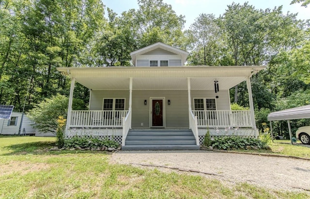 730 Carlew Rd, Waynesboro, TN 38485 - view of front of house featuring a porch, a front yard, and driveway