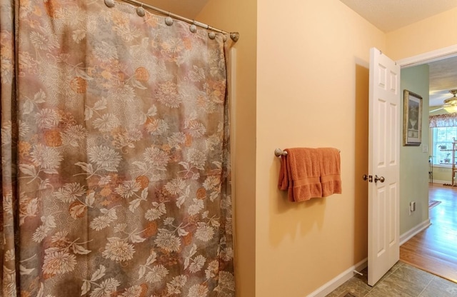 730 Carlew Rd, Waynesboro, TN 38485 - bathroom featuring curtained shower and tile patterned flooring