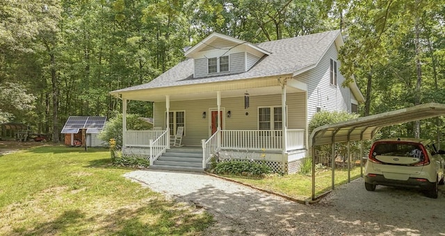 730 Carlew Rd, Waynesboro, TN 38485 - view of front of home with covered porch, a carport, a front yard, and a shingled roof
